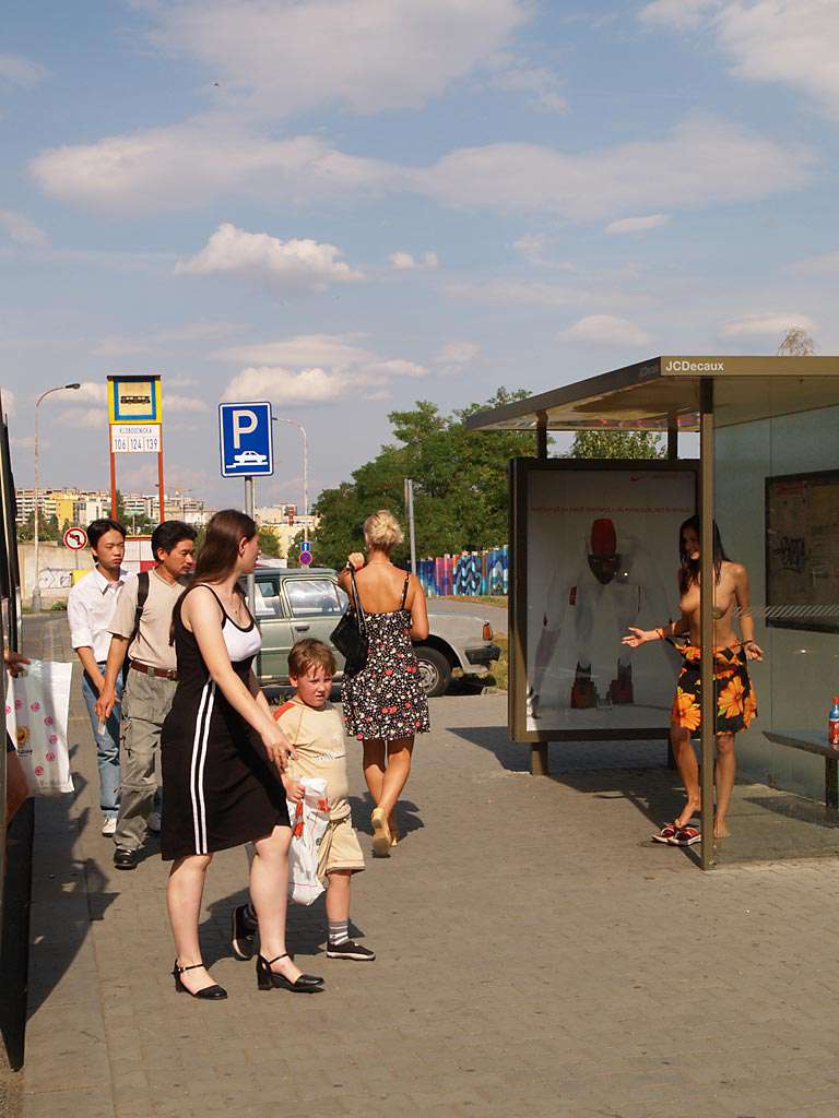 At a bus stop and at a kiosk